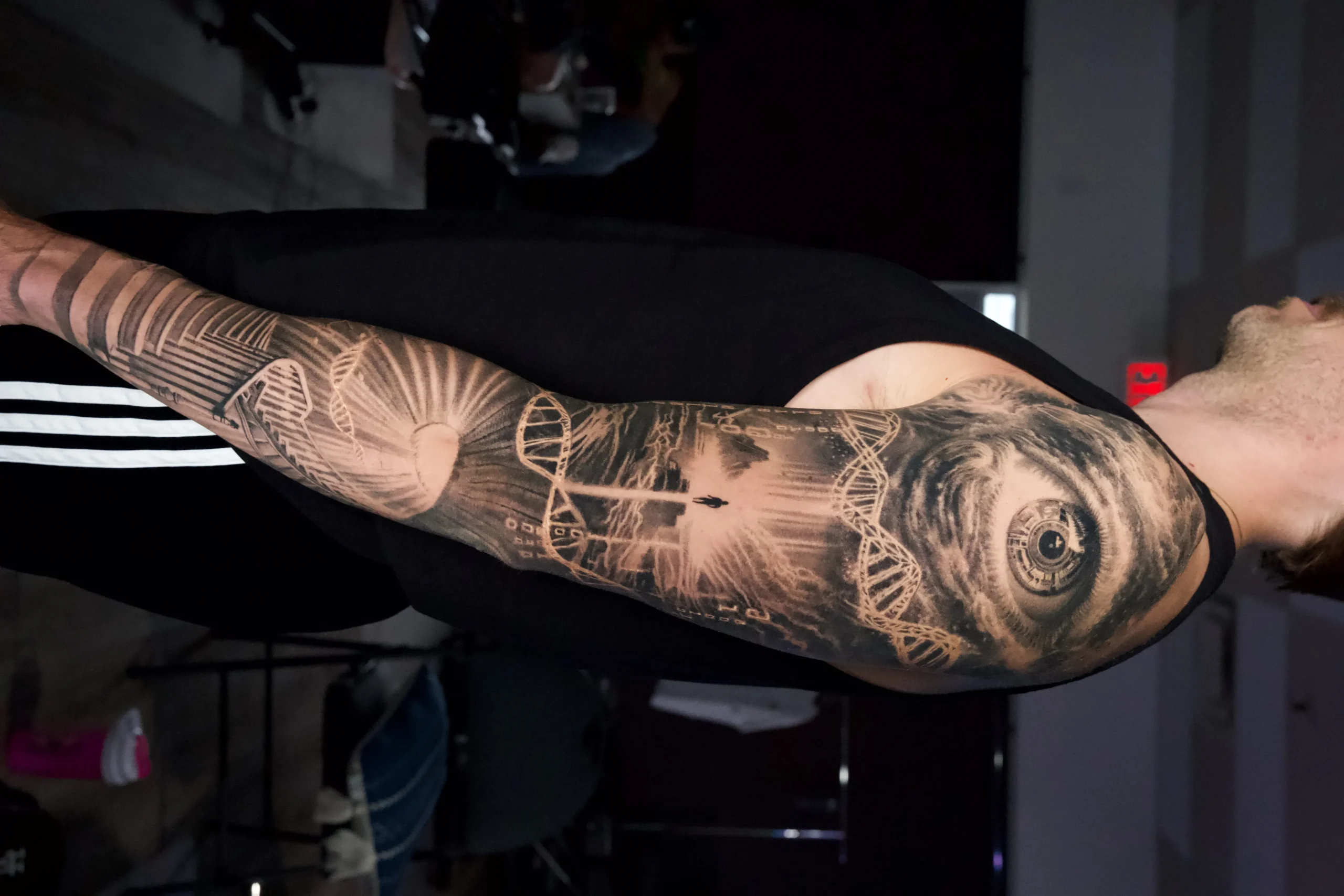 Black and grey realism full sleeve by The Kchn Tattoos in Scarborough, Ontario