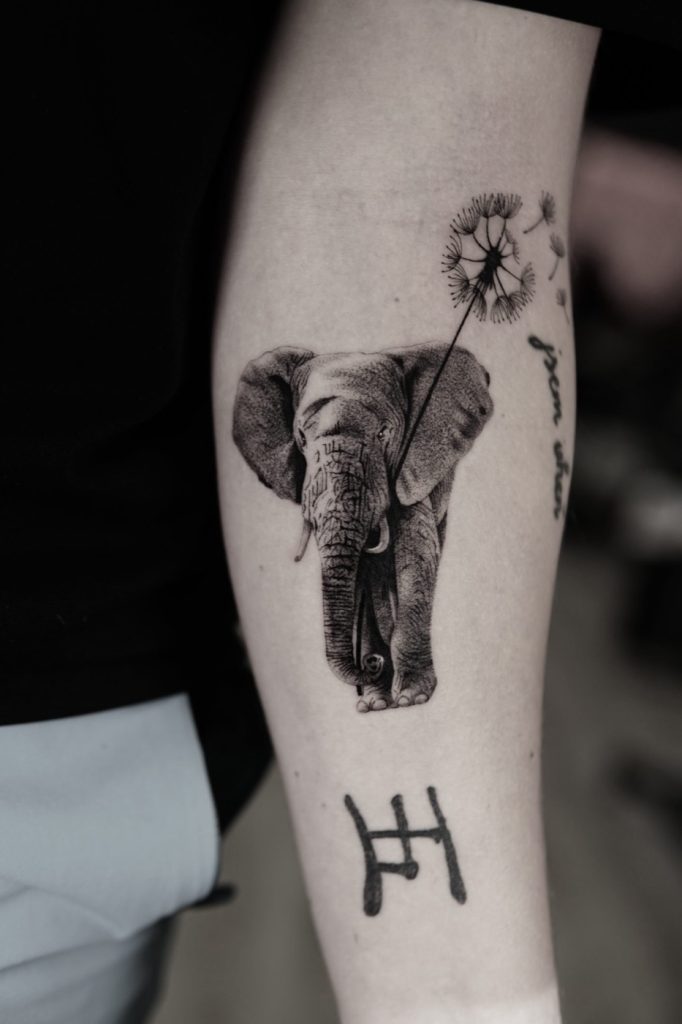 Blackwork elephant dandelion tattoo by The KCHN Tattoos, Scarborough
