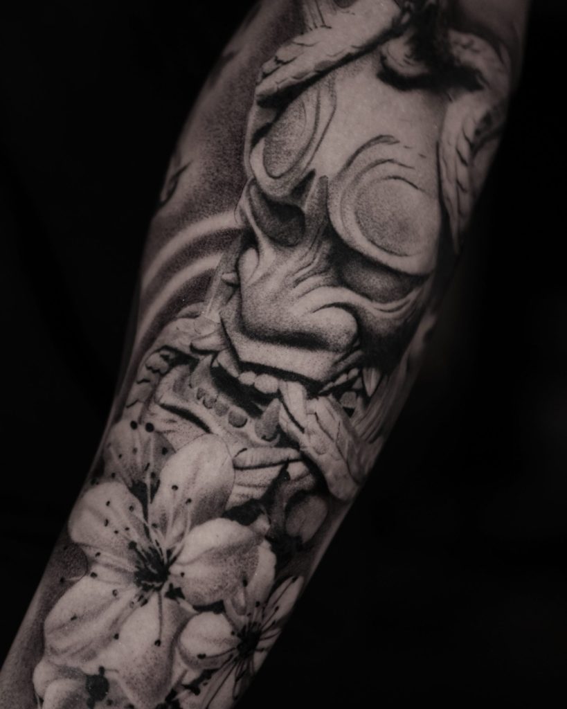Blackwork skull florals tattoo by The KCHN Tattoos, Scarborough