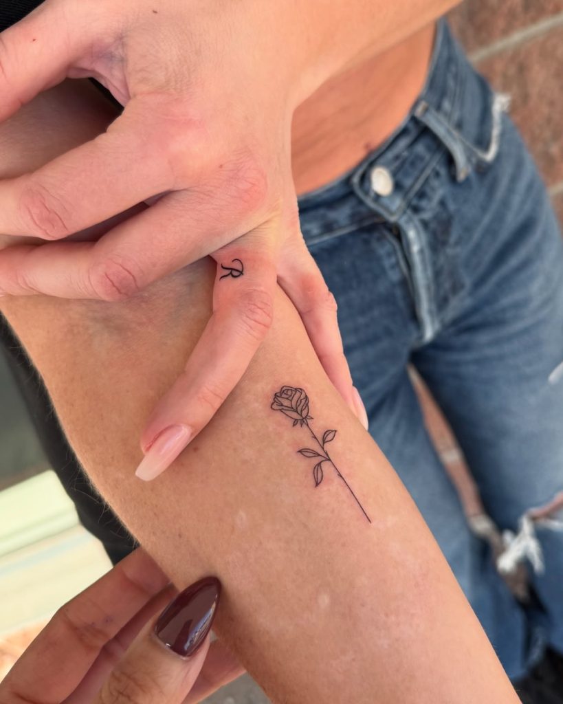 Fine line rose tattoo by The KCHN Tattoos, Scarborough
