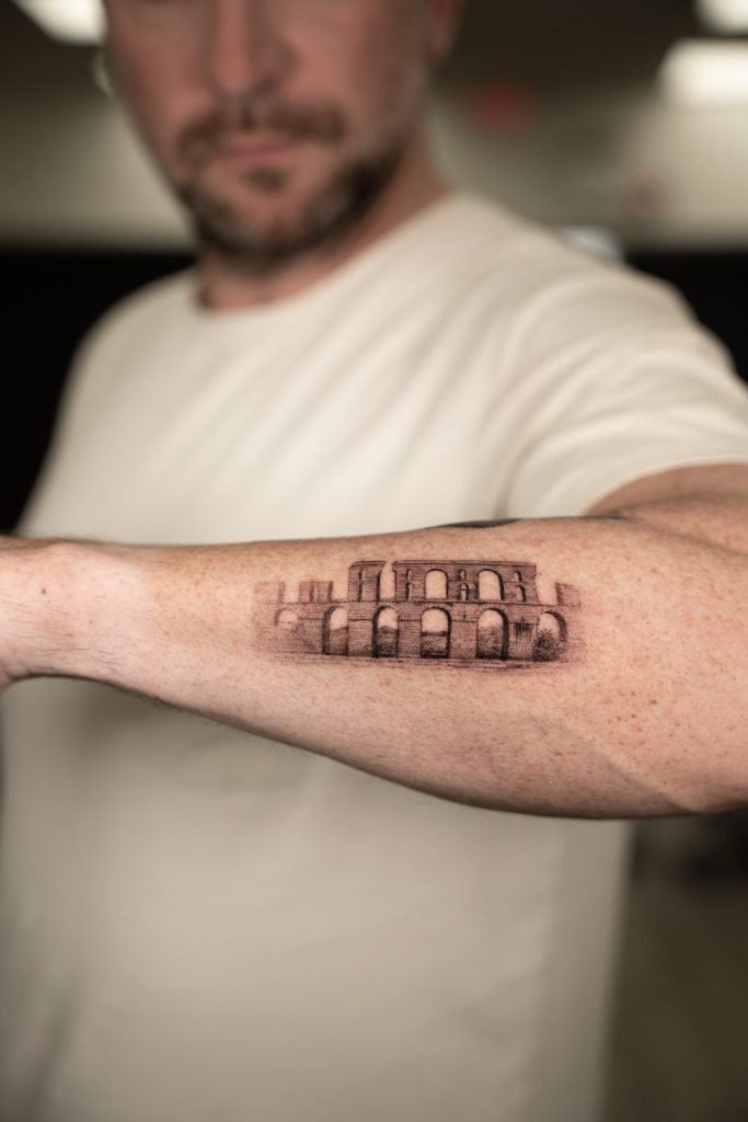 Micro realism colosseum tattoo by The KCHN Tattoos, Scarborough