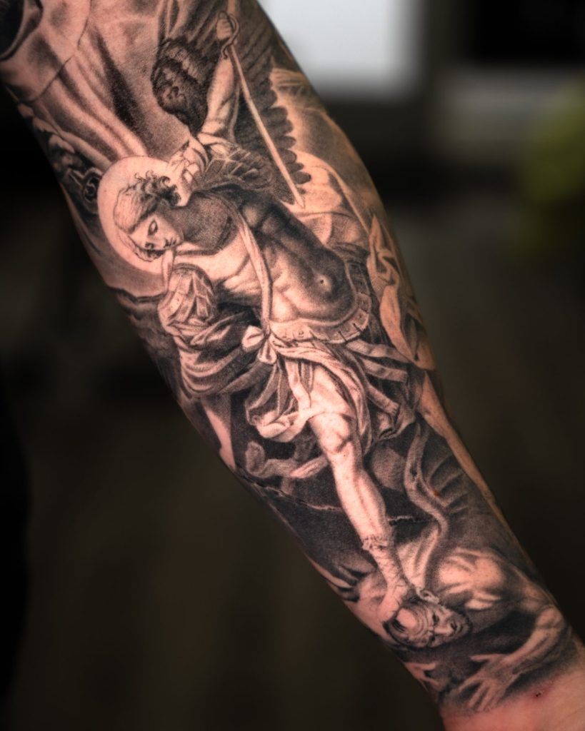 Black and grey realism archangel sleeve tattoo by The KCHN Tattoos, Scarborough