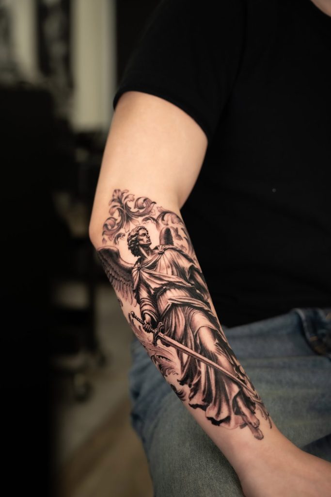 Black and grey realism goddess forearm tattoo by The KCHN Tattoos, Scarborough