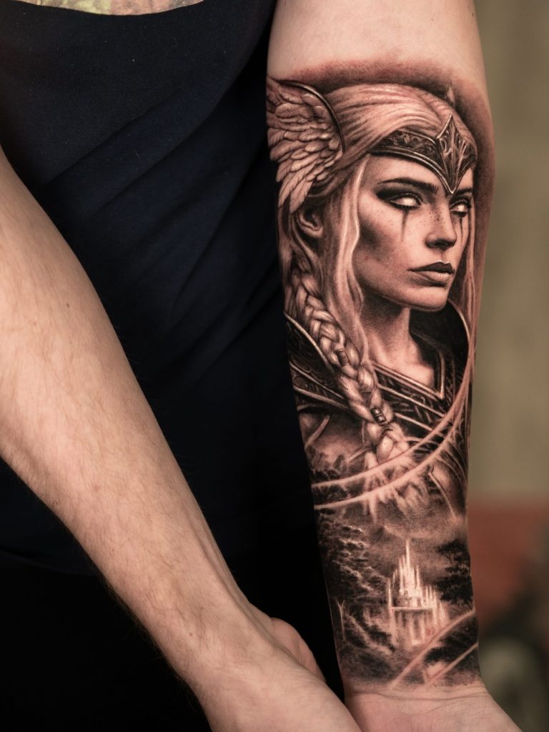 Black and grey realism warrior woman forearm tattoo by The KCHN Tattoos, Scarborough