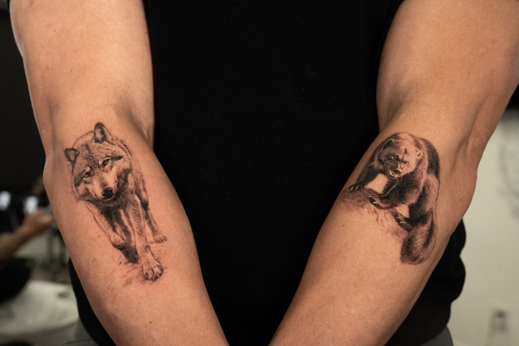 Black and grey realism wolf bear pair tattoo by The KCHN Tattoos, Scarborough